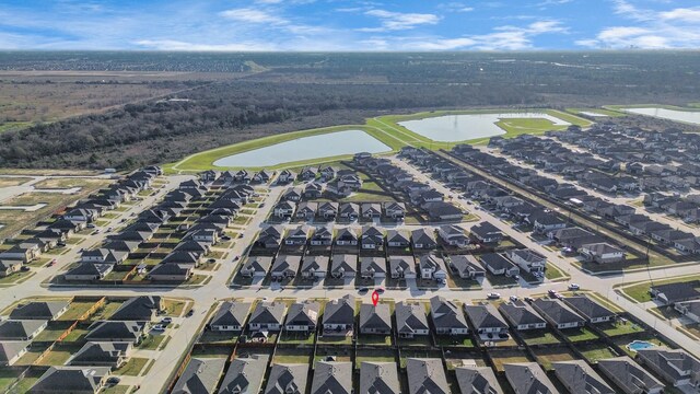 4727 Lombardy Fire Trl, Katy, TX 77449 - aerial overview of property's location featuring a nearby body of water and nearby suburban area