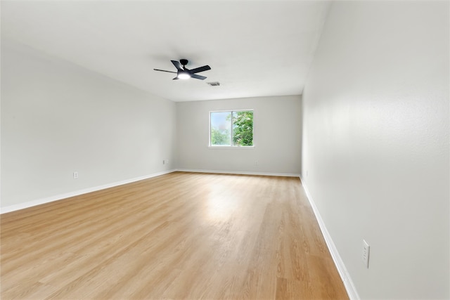 5318 Cilantro Ln, Baytown, TX 77521 - unfurnished room with ceiling fan, light wood-type flooring, and baseboards