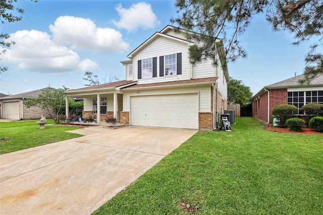 5318 Cilantro Ln, Baytown, TX 77521 - traditional home featuring concrete driveway, brick siding, an attached garage, a porch, and central AC