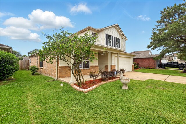 5318 Cilantro Ln, Baytown, TX 77521 - traditional-style house with brick siding, concrete driveway, and an attached garage