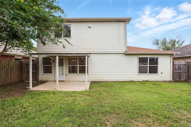 5318 Cilantro Ln, Baytown, TX 77521 - back of property featuring a patio