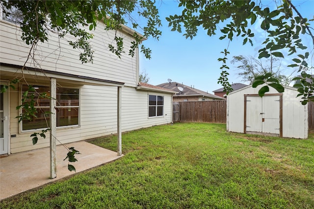 5318 Cilantro Ln, Baytown, TX 77521 - view of yard with a storage shed, a patio area, and an outdoor structure