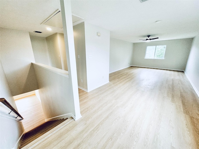 5318 Cilantro Ln, Baytown, TX 77521 - empty room with attic access, wood finished floors, baseboards, and a ceiling fan