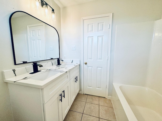 5318 Cilantro Ln, Baytown, TX 77521 - bathroom with tile patterned flooring, a tub, double vanity, and a shower