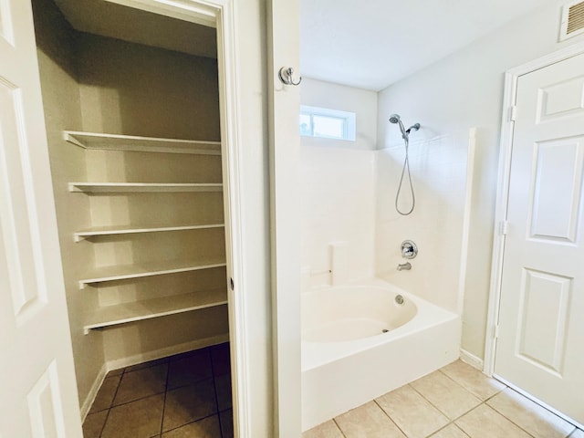 5318 Cilantro Ln, Baytown, TX 77521 - bathroom with tile patterned floors and washtub / shower combination