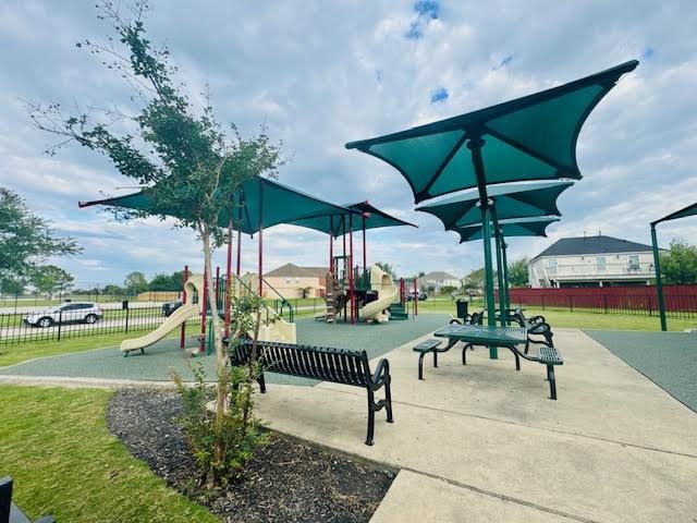 5318 Cilantro Ln, Baytown, TX 77521 - community play area with fence
