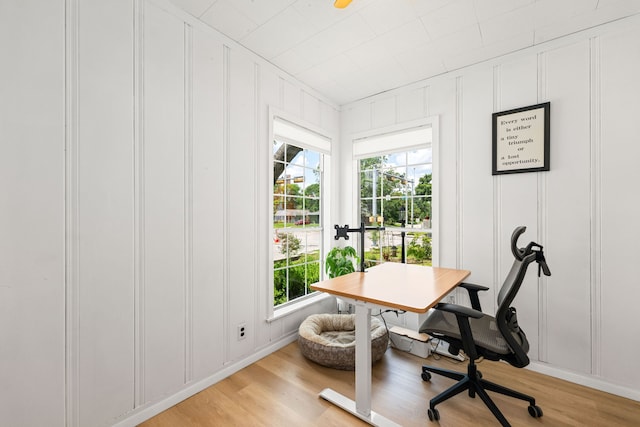 863 W 43rd St, Houston, TX 77018 - home office with a decorative wall, plenty of natural light, and light wood-style flooring