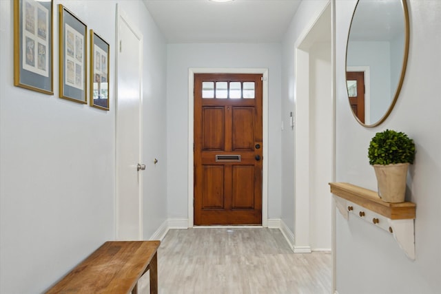 5402 Indigo St, Houston, TX 77096 - entrance foyer with baseboards and light wood finished floors