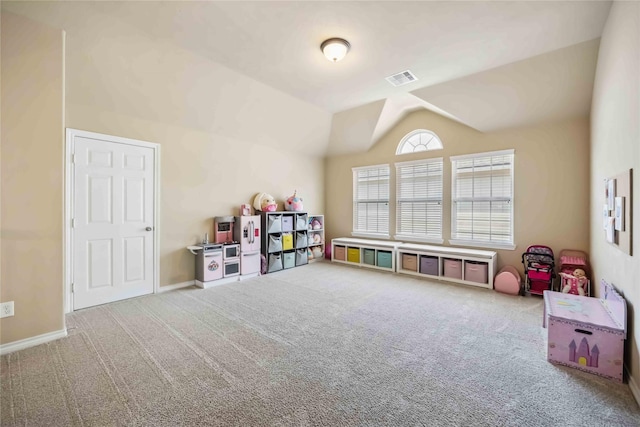 playroom featuring carpet floors, lofted ceiling, and baseboards