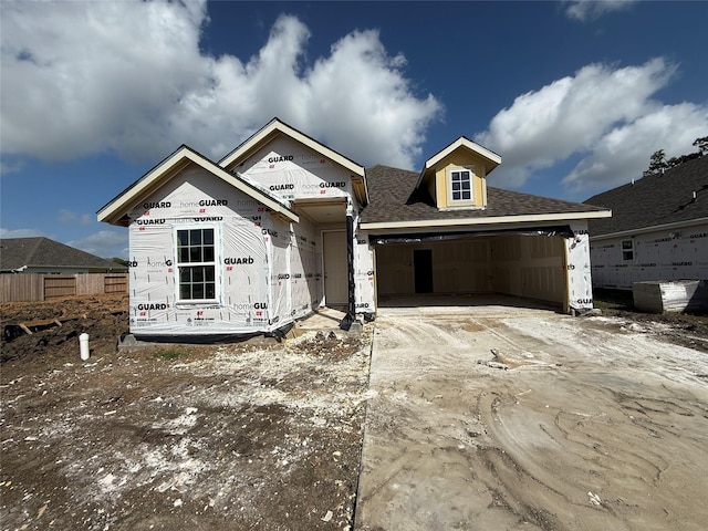 2443 Parker St, Seabrook, TX 77586 - property under construction featuring driveway, a garage, and roof with shingles
