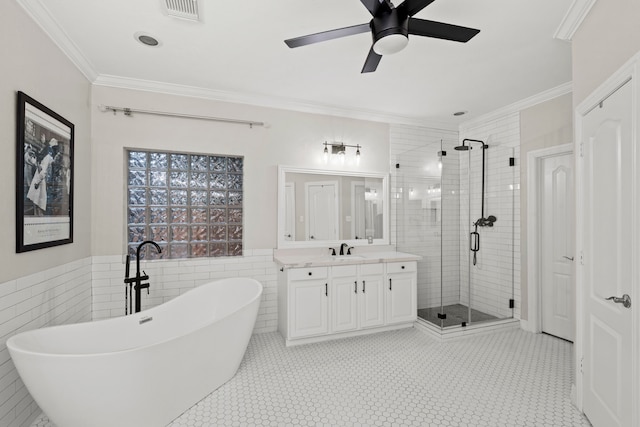 6503 Ambercrest Ct, Spring, TX 77389 - full bath featuring vanity, a stall shower, a freestanding bath, crown molding, and a ceiling fan