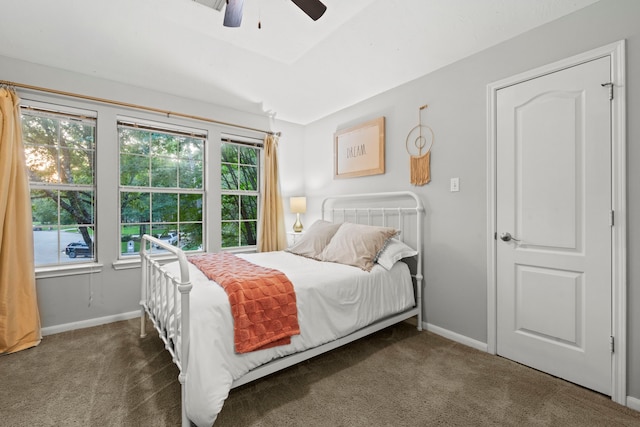 6503 Ambercrest Ct, Spring, TX 77389 - carpeted bedroom with baseboards and ceiling fan