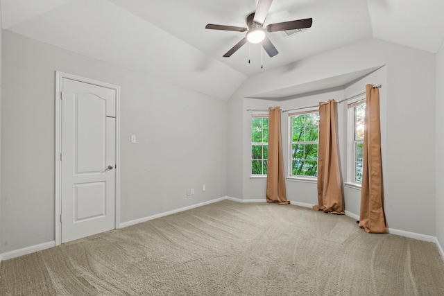 6503 Ambercrest Ct, Spring, TX 77389 - carpeted empty room with vaulted ceiling, ceiling fan, and baseboards