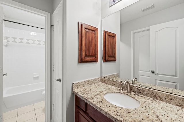 6503 Ambercrest Ct, Spring, TX 77389 - bathroom featuring vanity, shower / bathtub combination, and tile patterned floors