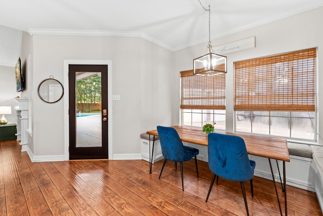 6503 Ambercrest Ct, Spring, TX 77389 - dining space featuring a chandelier, hardwood / wood-style floors, crown molding, and baseboards