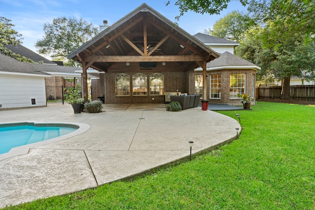 6503 Ambercrest Ct, Spring, TX 77389 - back of house featuring a gazebo, a patio, brick siding, and outdoor lounge area