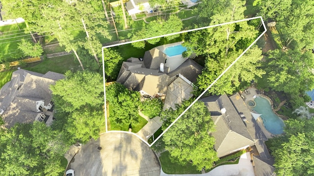 6503 Ambercrest Ct, Spring, TX 77389 - aerial view of property's location with a pool area and property parcel outlined