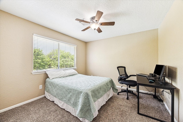 3119 Five Oaks Dr, Missouri City, TX 77459 - bedroom featuring carpet flooring, a textured wall, baseboards, a textured ceiling, and a ceiling fan