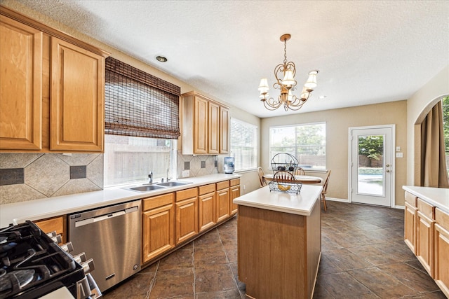 3119 Five Oaks Dr, Missouri City, TX 77459 - kitchen with stainless steel dishwasher, a sink, tasteful backsplash, a chandelier, and a kitchen island
