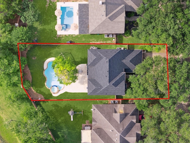 3119 Five Oaks Dr, Missouri City, TX 77459 - aerial view of property and surrounding area with a pool and property parcel outlined