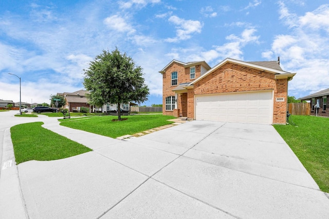 9703 Tipton Sands Dr, Humble, TX 77396 - traditional-style house with an attached garage, driveway, and brick siding