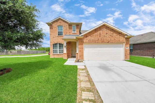 9703 Tipton Sands Dr, Humble, TX 77396 - traditional-style home featuring a garage, driveway, and brick siding