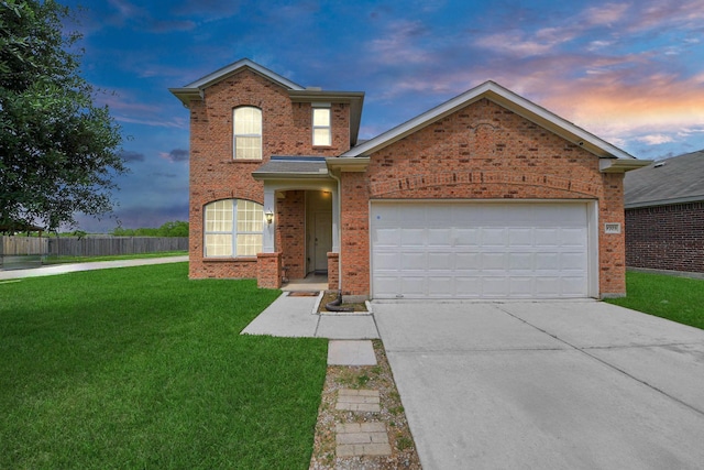 9703 Tipton Sands Dr, Humble, TX 77396 - traditional-style home featuring brick siding, concrete driveway, and an attached garage
