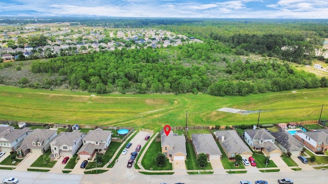 9703 Tipton Sands Dr, Humble, TX 77396 - aerial view of property's location featuring nearby suburban area and a heavily wooded area