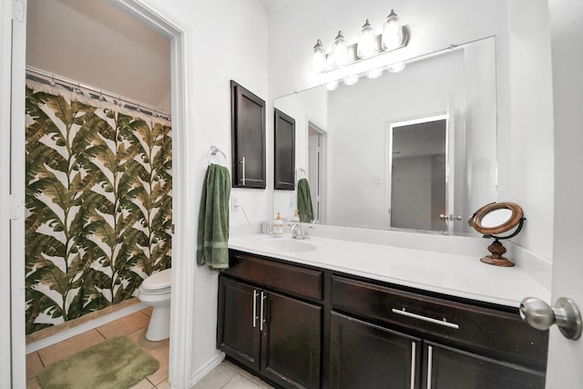 9703 Tipton Sands Dr, Humble, TX 77396 - full bathroom featuring vanity, toilet, tile patterned floors, and a shower with shower curtain