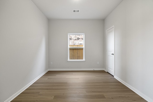377 Tejas Trl, Waller, TX 77484 - empty room with wood finished floors and baseboards