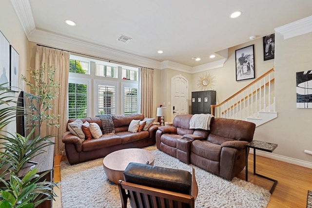 3219 N Pemberton Circle Dr, Houston, TX 77025 - living room featuring wood finished floors, recessed lighting, crown molding, stairway, and baseboards