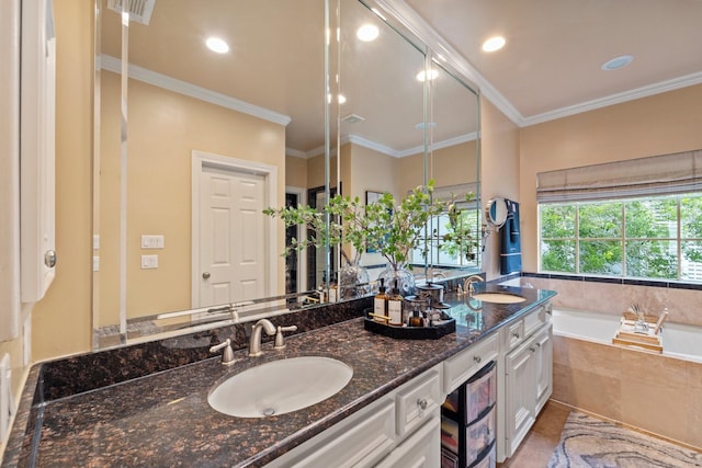 3219 N Pemberton Circle Dr, Houston, TX 77025 - full bathroom featuring a bath, double vanity, crown molding, recessed lighting, and tile patterned flooring