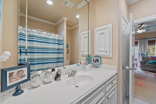 3219 N Pemberton Circle Dr, Houston, TX 77025 - full bath featuring ornamental molding, vanity, ceiling fan, toilet, and recessed lighting