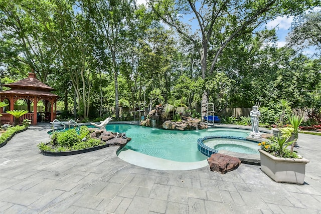 3230 Ivy Falls Dr, Houston, TX 77068 - view of swimming pool with a gazebo, a pool with connected hot tub, a patio area, and fence