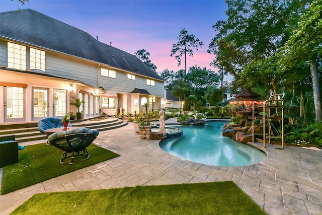 3230 Ivy Falls Dr, Houston, TX 77068 - view of pool with a patio, a pool with connected hot tub, and french doors