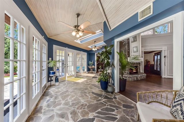 3230 Ivy Falls Dr, Houston, TX 77068 - sunroom / solarium featuring french doors, plenty of natural light, and vaulted ceiling
