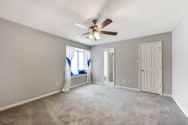 3230 Ivy Falls Dr, Houston, TX 77068 - carpeted spare room featuring a ceiling fan and baseboards