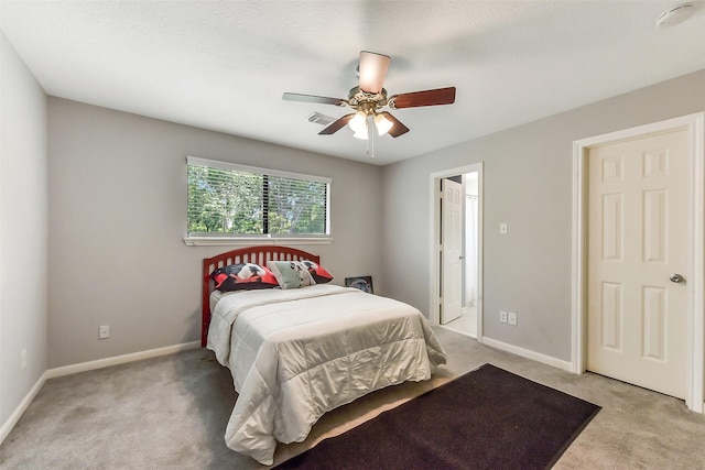 3230 Ivy Falls Dr, Houston, TX 77068 - bedroom featuring light carpet, baseboards, and ceiling fan
