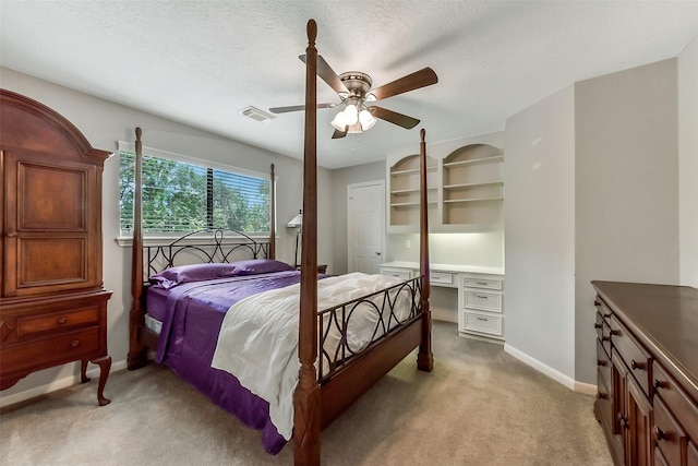 3230 Ivy Falls Dr, Houston, TX 77068 - bedroom featuring light colored carpet, baseboards, ceiling fan, a textured ceiling, and a closet