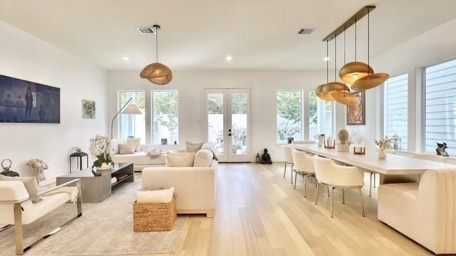 1918 Hoskins Dr, Houston, TX 77080 - living area with light wood-type flooring, recessed lighting, and french doors