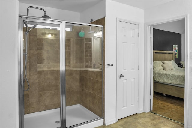 full bathroom with a shower stall, ensuite bath, and tile patterned flooring