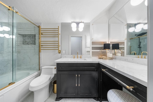 1924 Boulder Ridge Dr, Conroe, TX 77304 - full bathroom featuring toilet, shower / bath combination with glass door, vanity, a towel warmer, and radiator