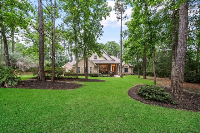 1924 Boulder Ridge Dr, Conroe, TX 77304 - view of green lawn with covered porch