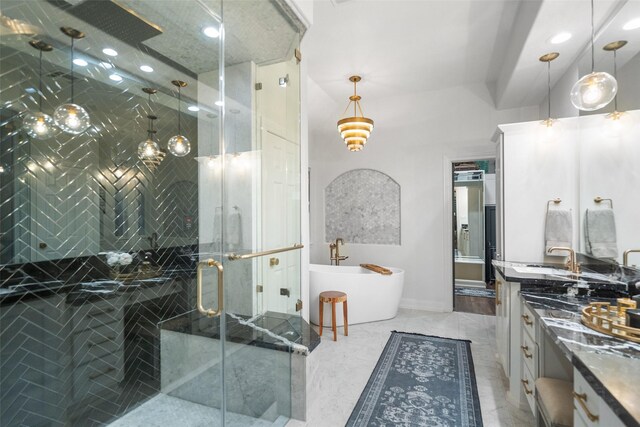 1924 Boulder Ridge Dr, Conroe, TX 77304 - bathroom featuring vanity, a freestanding bath, a shower stall, and recessed lighting