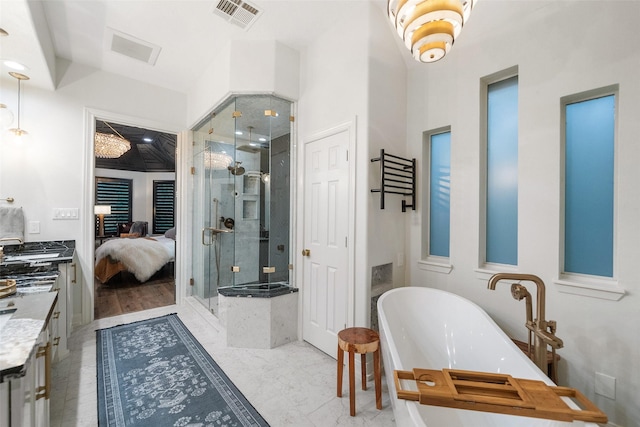 1924 Boulder Ridge Dr, Conroe, TX 77304 - ensuite bathroom with vanity, a stall shower, and a freestanding bath