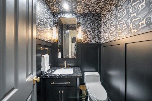 1924 Boulder Ridge Dr, Conroe, TX 77304 - half bath with toilet, wallpapered walls, and vanity