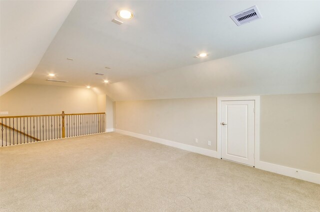 bonus room with carpet floors, lofted ceiling, baseboards, and recessed lighting
