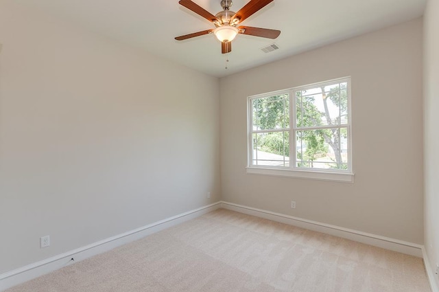 1814 Napa Creek Ln, Houston, TX 77009 - spare room with plenty of natural light, baseboards, light carpet, and ceiling fan
