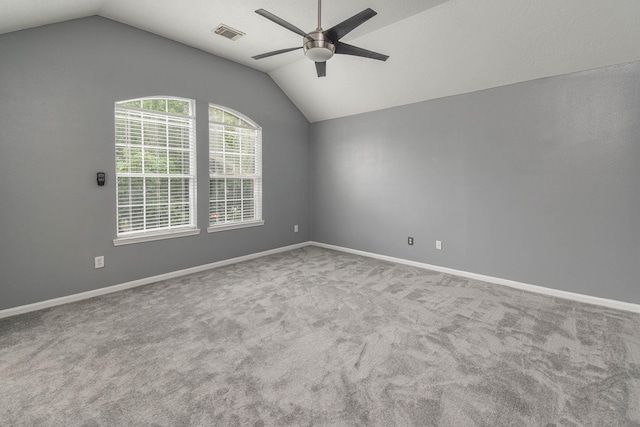 5509 N Buffalo Cir, Willis, TX 77378 - spare room with ceiling fan, vaulted ceiling, carpet, and baseboards