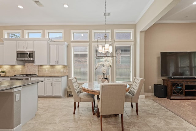 514 Pearl View Ln, Pinehurst, TX 77362 - dining room featuring crown molding, a chandelier, baseboards, and recessed lighting